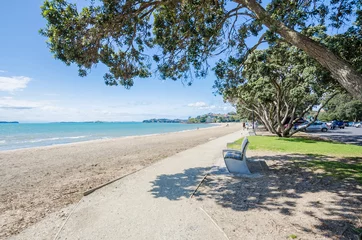 Gardinen Mission Bay is a beautiful white-sand beach which is located at Auckland,New Zealand © gracethang