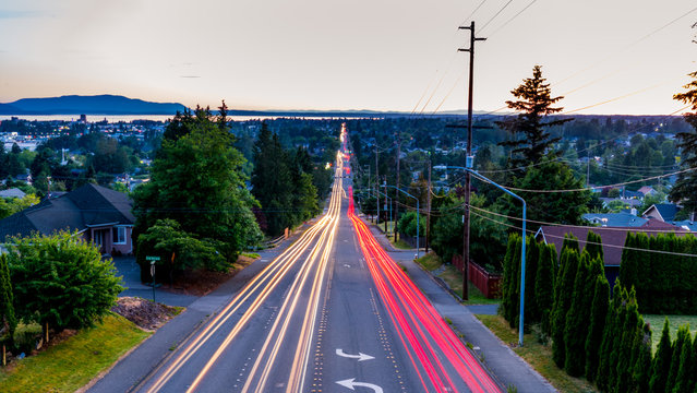 View from above the city. Long exposure of Bellingham, Whatcom County.Cars trail lights and a sublime view of the Pacific ocean in the background.