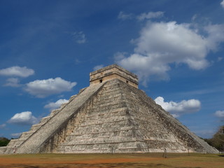 People visiting the ancient buildings of maya culture in chichen itza, quitana roo, mexico, like the pyramid, jaguar temple, planetary, etc.