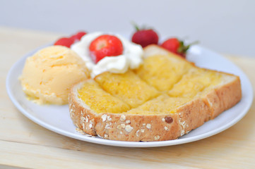 toast or bread with butter topping and ice cream