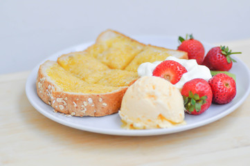 toast or bread with butter topping and ice cream