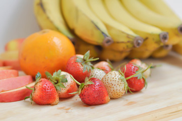 strawberry ,apple, orange and banana