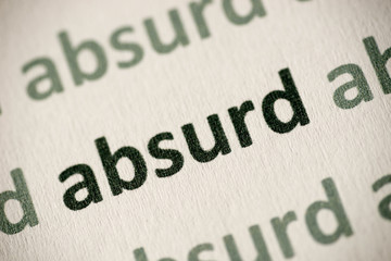 word absurd printed on paper macro