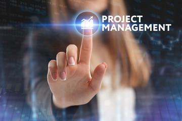 The concept of business, technology, the Internet and the network. A young entrepreneur working on a virtual screen of the future and sees the inscription: Project management