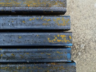 rusty metal tube on cement floor for background