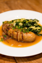 Grilled sausage with Cheesy Creamed Spinach