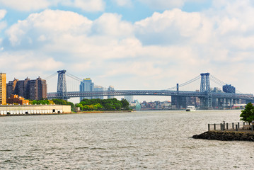 New York view of the Lower Manhattan and the Williamsburg Bridge  across the East River.