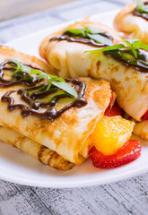 Pancakes with sliced strawberries