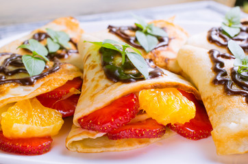 Pancakes with sliced strawberries