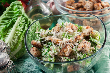 Healthy caesar salad with cheese and croutons