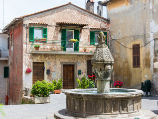 Fototapeta na wymiar Sutri in Lazio, Italy. Fountain in the city center
