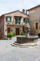 Fototapeta na wymiar Sutri in Lazio, Italy. Fountain in the city center