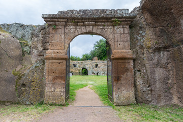 Sutri in Lazio, Italy. Entrance to the rock-hewn amphitheatre of the Roman period