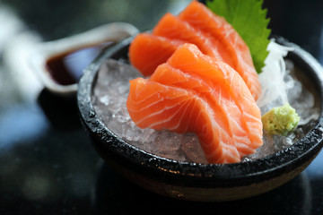 Salmon sashimi on ice Japanese food - obrazy, fototapety, plakaty