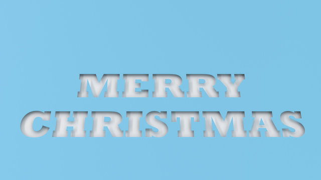 White Merry Christmas words cut in blue paper