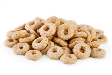 healthy cereal rings on white background. Good morning. A healthy, healthy breakfast. Dry muesli.