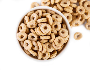 healthy cereal rings on white background. Good morning. A healthy, healthy breakfast. Dry muesli.