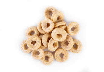 healthy cereal rings on white background. Good morning. A healthy, healthy breakfast. Dry muesli.
