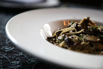 Spaghetti truffle cream sauce with mushroom