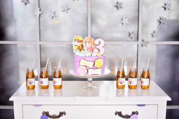 Decorations for holiday party. A lot of balloons pink and white color. A lot of cakes. Birthday party decorations. 