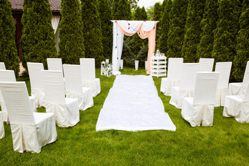 Wedding arch outdoors. Beautiful wedding set up.