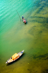 Fishing boat with people in national dress in Vietnam 