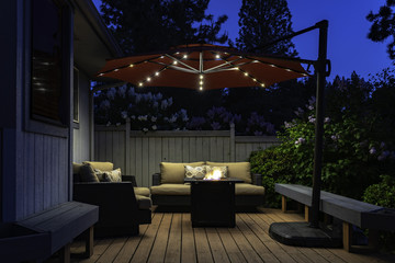 Backyard Deck Umbrella Summer Scene at Twilight - obrazy, fototapety, plakaty