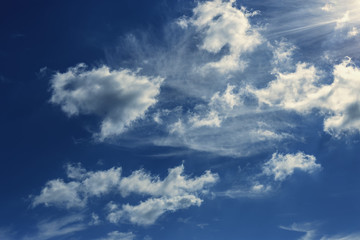 Beautiful blue sky with white clouds as a natural background.