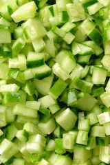 Fresh cucumber finely chopped for cooking salads or wraps