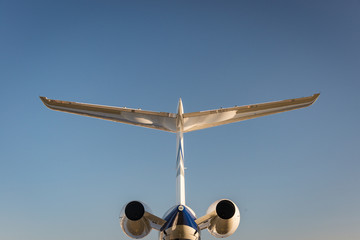 Private jet tail, from behind