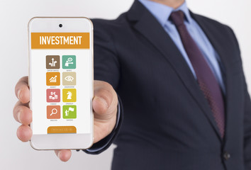 Man showing smartphone Investment on screen
