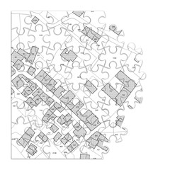 Imaginary cadastral map of territory with buildings and roads - concept image in jigsaw puzzle shape
