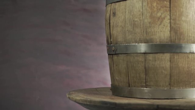 Background of barel on a wooden table, rotation 360 degrees. Beautiful dark background.	