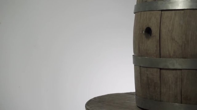 Background of barel on a wooden table, rotation 360 degrees. Beautiful white background.	