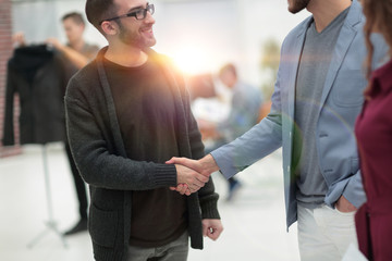 closeup.the handshake between the designer and the client