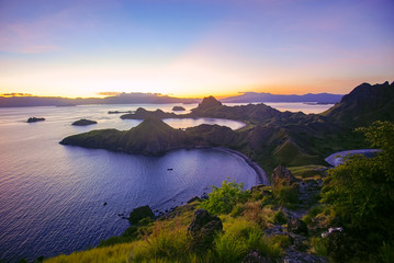 Panoramic view of majestic Padar Island during magnificent sunset. Soft focus and Noise slightly appear due to high iso.