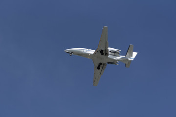 Executive jet with flaps and landing gear extended for a landing