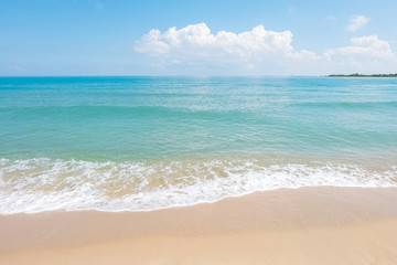 HDR shot of sea shore with wave and white sand during summer day in thailand (selective focus and white balance / color tone shift )