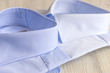 Pack of blue formal men's shirts close up