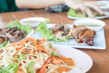 Thai Cuisine, Green papaya salad, call somtom in Thai with selective focus