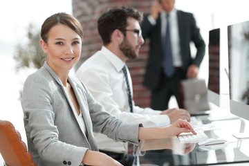 portrait of confident business woman in her office