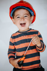 A young boy dreams of becoming a builder guy