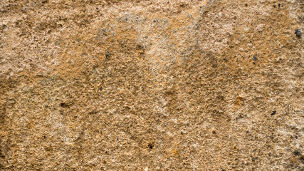 Background of old yellow stone texture.