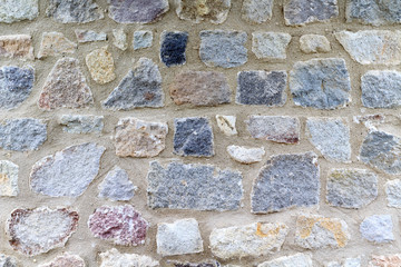 Made of natural stones, completely grouted masonry, texture