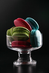 A vase full of  macaroons