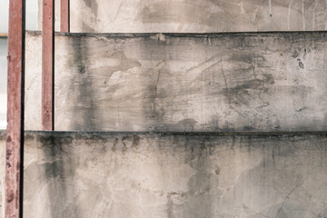 detail of grey concrete stairs in old building