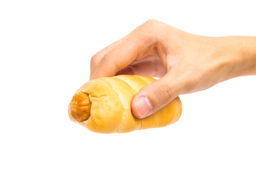 hand holding sausage bread roll isolated on white background
