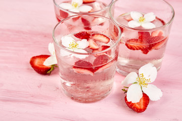 Strawberry detox water with jasmine flower.