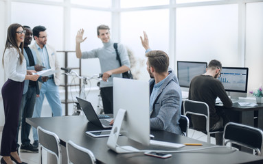 business team giving each other high five