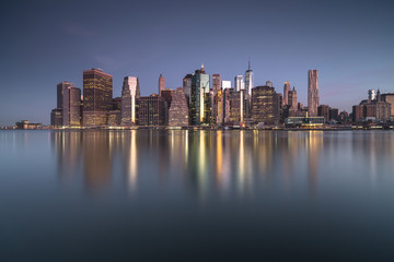 Fototapeta na wymiar Downtown Manhattan view with water reflection